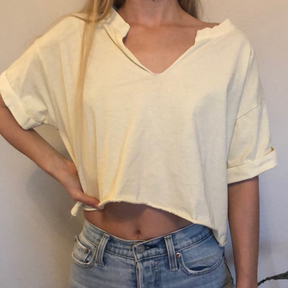 Light yellow casual top. Size M